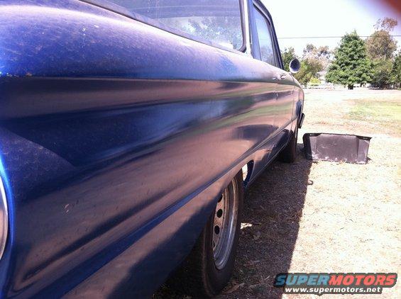 1963 Ford Ranchero side profile, blue paint, steel wheels