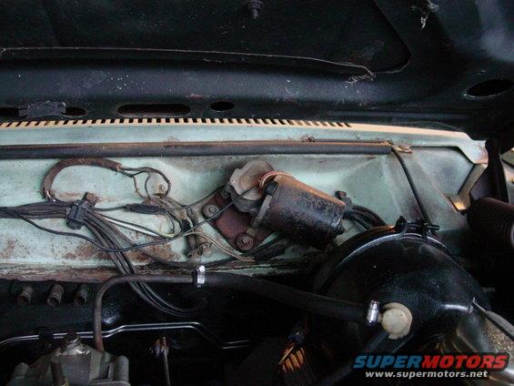 1969 Ford Torino engine bay showing windshield wiper motor and brake booster