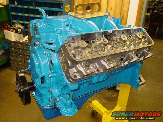 Blue engine block with "302" visible on the side