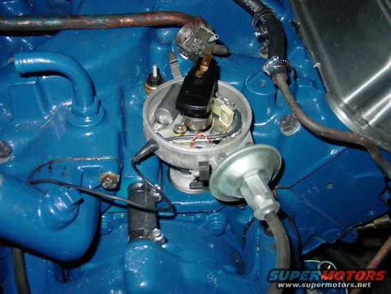 Blue engine block with distributor and wiring