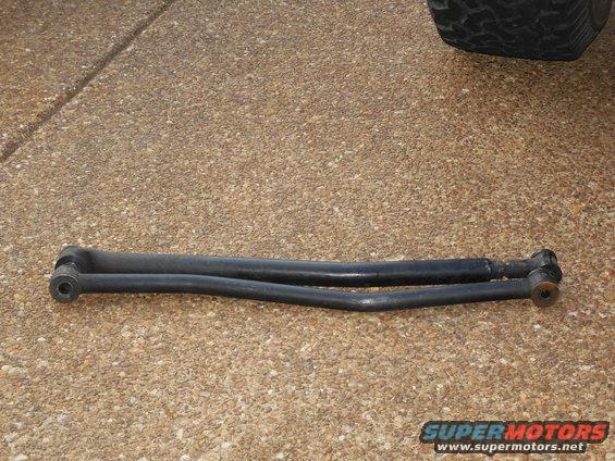 track02.jpg We needed the adjustable track bar to align the axle under the frame, but it's at its minimum length now, and it's too long.  So I'm moving the new bushings into the factory bar.