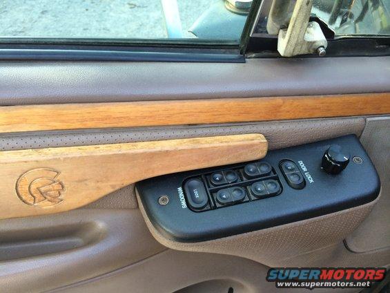 1997 Ford F-350 interior door panel with wood trim and power window controls