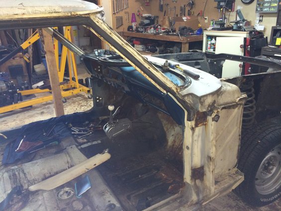 1964 Ford Fairlane interior showing disassembled dashboard and floor