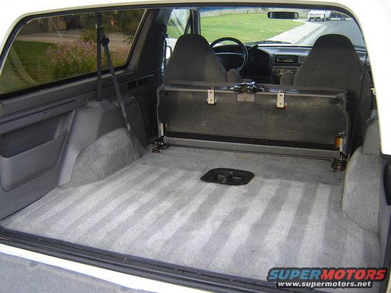 Interior cargo area and front seats of a 1996 Ford Bronco