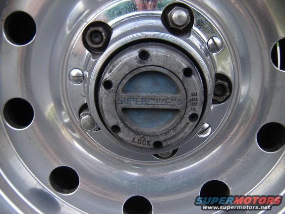 close-up of a wheel hub with a Superwinch locking mechanism