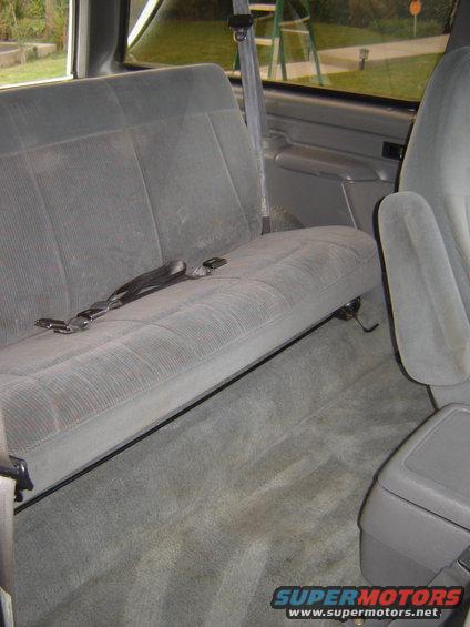 Gray cloth rear bench seat and armrest in 1996 Ford Bronco interior