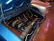 1971 Ford Ranchero - Engine bay of a blue car, with a silver car in the background.