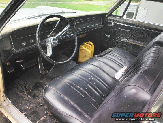 1966 Pontiac Catalina interior with black seats and dashboard