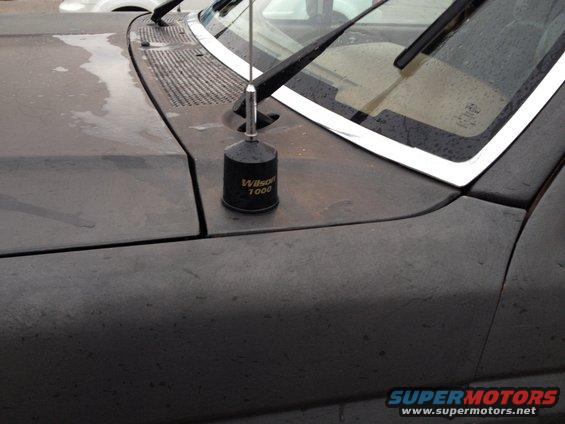 Wilson 1000 antenna on dark vehicle hood