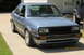1985 Volkswagen GTI - This 1985 Volkswagen Jetta is seen from a 3q front angle, parked next to another vehicle.