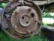 1979 Ford Bronco - Close-up of a heavily rusted brake drum assembly, showing internal components and springs.