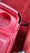 1989 Ford Bronco - The red plastic console shows significant cracking and damage along its edge.