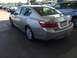 2014 Honda Accord - This silver sedan has a license plate frame from Honda of Seattle, indicating it is likely a Honda Accord.