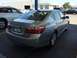 2014 Honda Accord - Rear 3/4 view of a silver 2014 Honda Accord sedan parked outdoors.