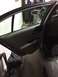 2014 Honda Accord - The interior door panel and open door of a car are visible in this image.