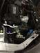 2014 Honda Accord - The engine bay of a 2014 Honda Accord is visible, the 'Earth Dreams Technology' engine cover.