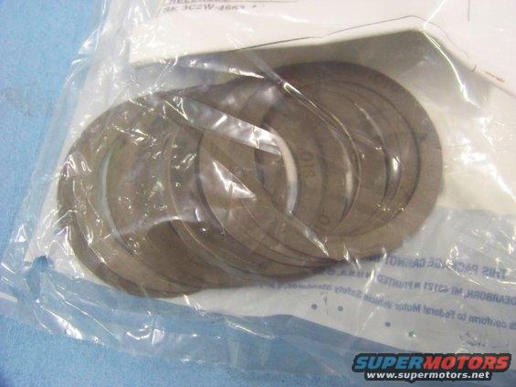 Differential shims in plastic packaging with visible text