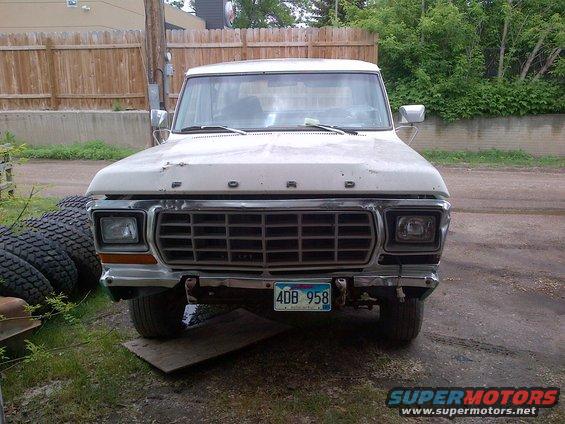 White 1978 Ford Bronco front view, grille and headlights visible, license plate 4DB 958