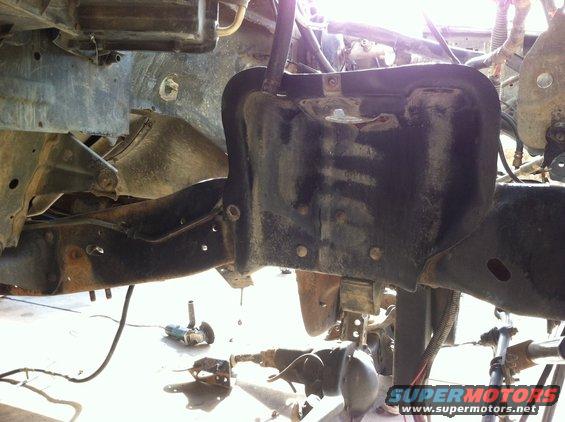 Frame and suspension parts with tools on the ground