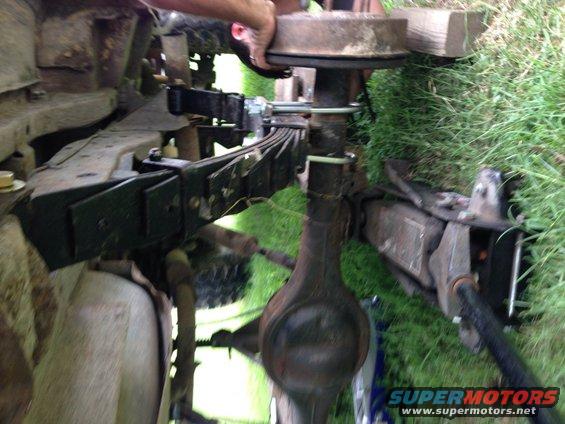 1979 Ford Bronco rear axle with leaf springs and brake drum visible