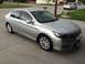 2014 Honda Accord - A silver sedan is parked on a concrete driveway in front of a house.