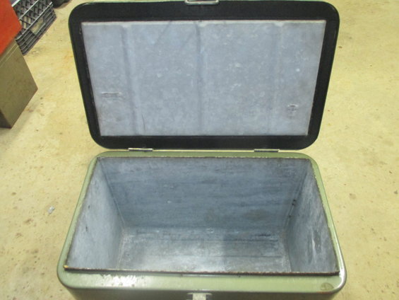 Open green cooler with metal interior