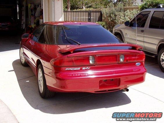 Red 1995 Ford Probe rear view with 'Probe 24V' badge