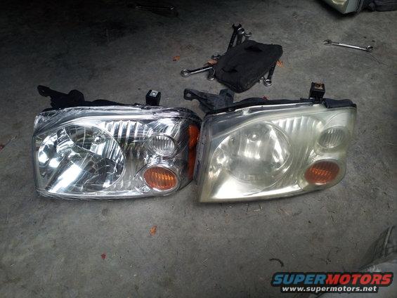 2003 Nissan Frontier headlights, one new, one used