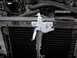 1990 Ford Bronco - Front end of a 1990 Ford Bronco, focusing on the radiator and hood latch assembly.