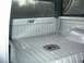 1990 Ford Bronco - The interior of a truck bed, showing the ribbed metal floor and sides after a paint job.