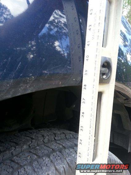 Measuring the height of a vehicle's tire and suspension with a level and ruler