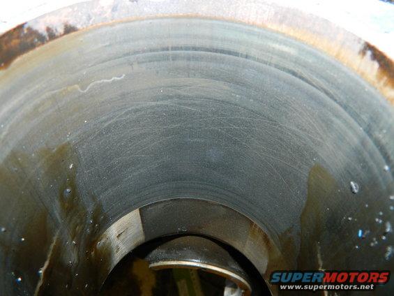 Cylinder wall with visible scoring and oil residue