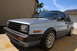 1990 Volkswagen Jetta - A light blue 1990 Volkswagen Jetta is shown from the front three-quarter angle in a driveway.
