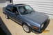 1990 Volkswagen Jetta - Blue 1990 Volkswagen Jetta sedan with a sunroof and aftermarket wheels.