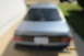 1990 Volkswagen Jetta - The rear of a silver sedan is visible, with a blurred license plate.