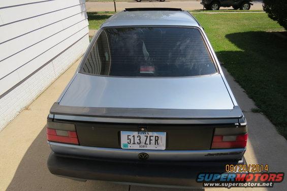 1990 Volkswagen Jetta rear view, silver with black trim and spoiler. Iowa license plate 513 ZFR