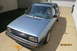 1990 Volkswagen Jetta - This 1990 Volkswagen Jetta is seen in a driveway with a garage and fence in the background.