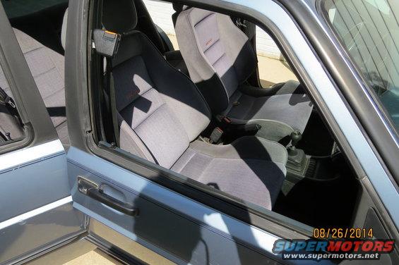 Light blue 1990 Volkswagen Jetta interior with grey cloth seats and a manual transmission