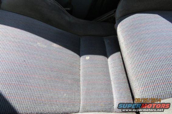 Car interior seats with striped fabric. Date stamp on photo reads 08/26/2014