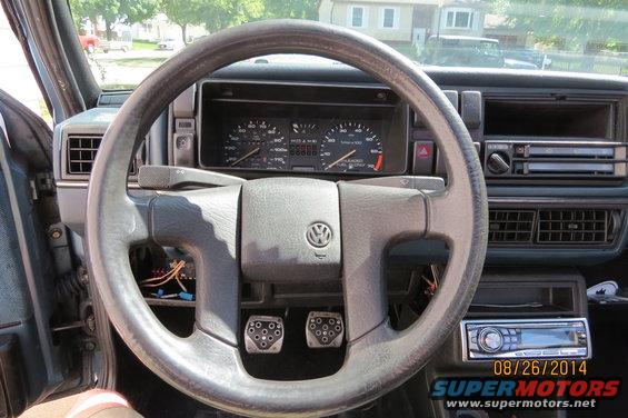 Interior view of a Volkswagen with dashboard and steering wheel