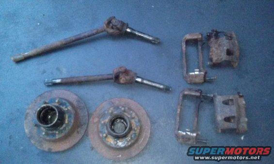 Two brake rotors and two sets of brake calipers and spindles