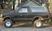 1988 Ford Bronco - This 1988 Ford Bronco is shown in profile, aftermarket wheels and a lifted suspension.