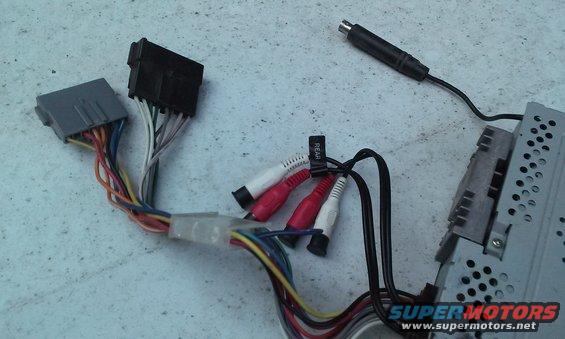 Car stereo wiring harness with RCA cables and an antenna adapter