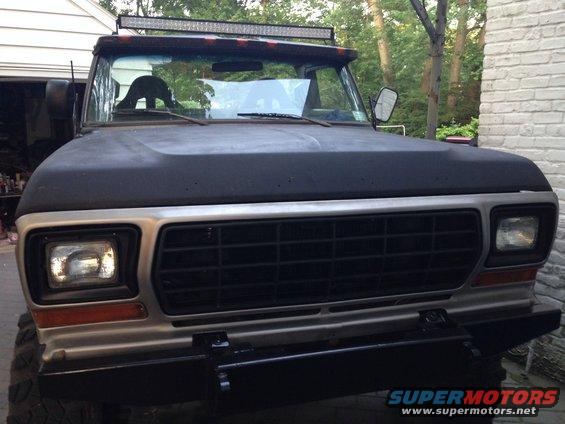 1979 Ford Bronco front view, showing grille, headlights, and aftermarket bumper