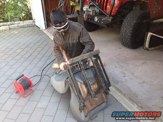 cutting off the old seat brackets