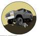 1979 Ford Bronco - This 1978 Ford Bronco is depicted in a three-quarter front view, navigating an uneven terrain.