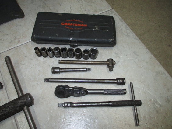 Craftsman socket set with ratchet, extensions, and sockets laid out