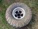 1979 Ford Bronco - This is a close-up of an off-road tire and rim, not a 1979 Ford Bronco.