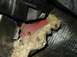 1998 Mercury Sable - A view of the vehicle's interior reveals exposed wiring and insulation near a red painted metal component.