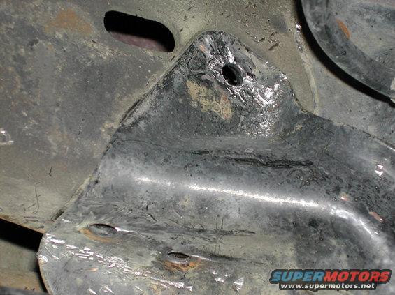 lift_06.jpg All three rivets on the driver's side brack have been removed.